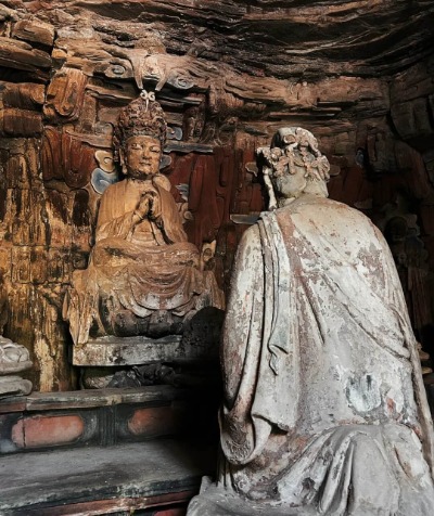 The stone Buddha statues at the Dazu Rock Carvings.