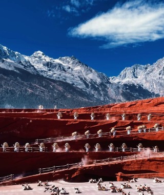 Behind the "Impression Lijiang" stage looms the towering Jade Dragon Snow Mountain—spectacular!