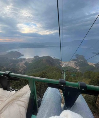 Getting off the cable car at Yak Meadow, you can see a large lake in the distance.