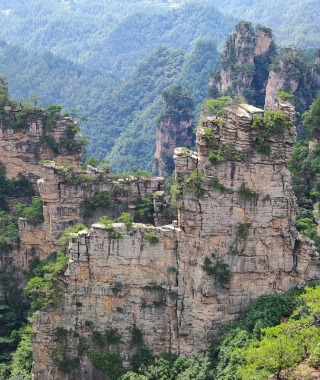 Multiple stone peaks are connected, forming a thin wall, almost like the Great Wall.