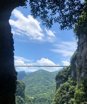 Zhangjiajie China Glass Bridge connects the two sides of the canyon.