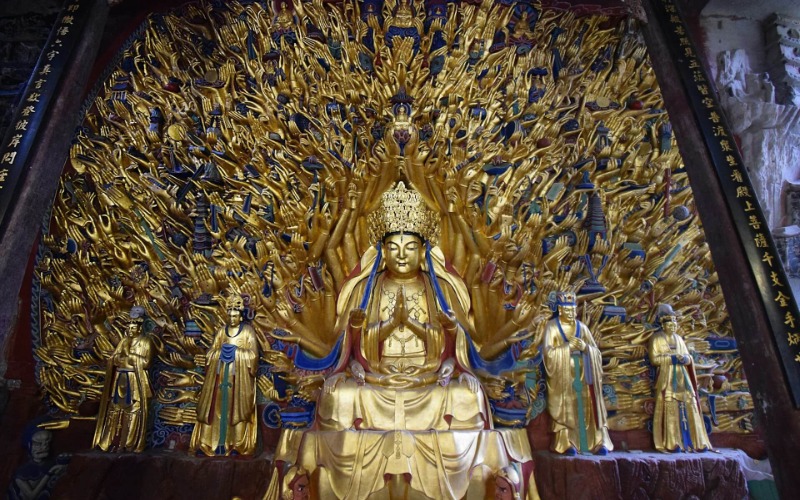 The Thousand-armed Avalokitesvara statue at the Dazu Rock Carvings.